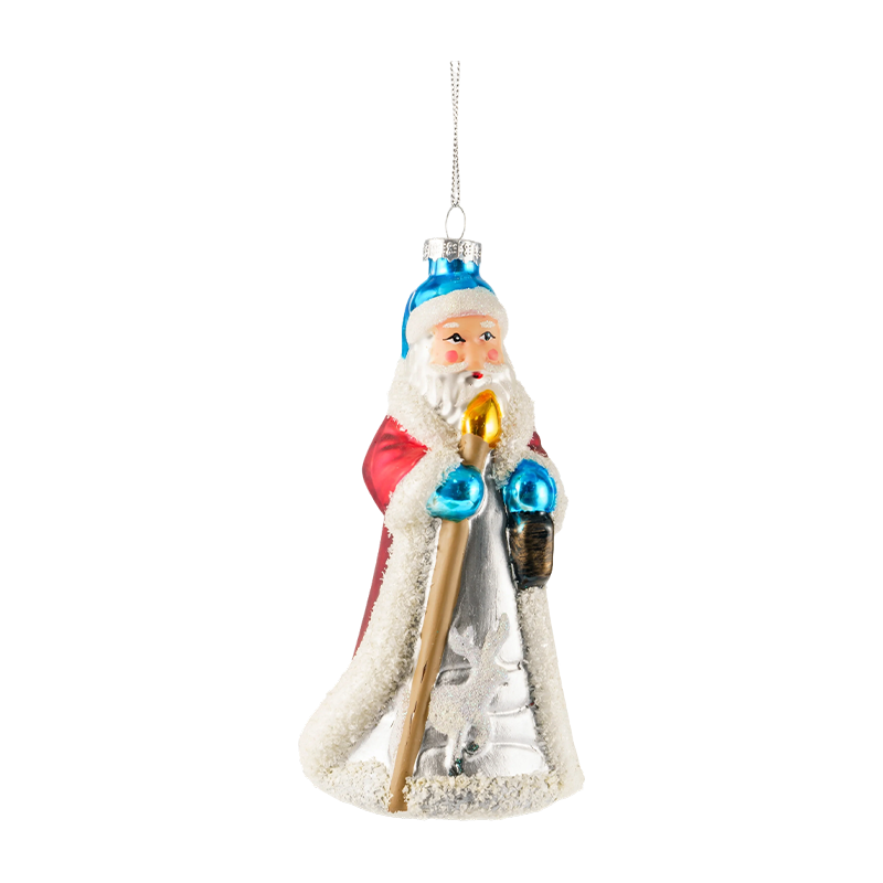 Handmålade julprydnader av blåst glas